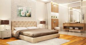 Une verrière pour séparer la salle de bains et la chambre.