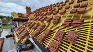 Rénovation d'une toiture en tuiles plates de Bourgogne