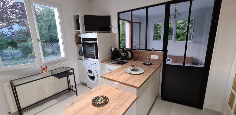 Cuisine semi-ouverte avec verrière