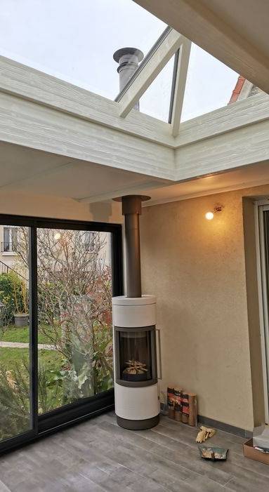 Chauffer sa véranda en hiver avec un poêle à bois moderne - Nantes 44