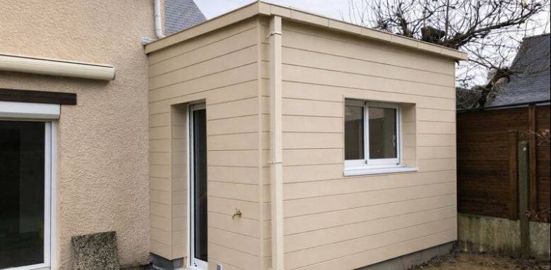 Extension maison bardage composite beige à Francheville 69340