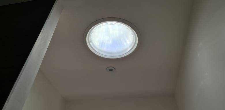 Plancher de verre, souplex et puits de lumière