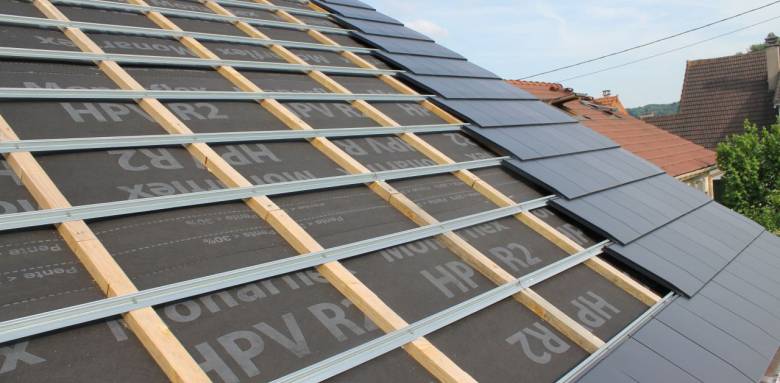 rénovation de toiture en tuiles béton