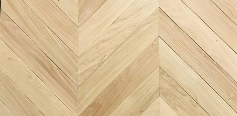 Le parquet dans tout ses états : pose en chevrons ou Point de Hongrie