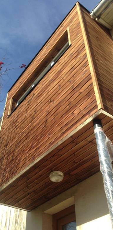 Extension latérale bois en façade latérale maison