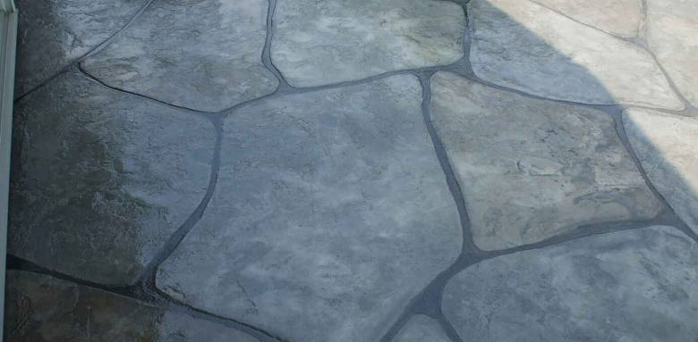 Terrasse en béton décoratif imitation pavés à Draveil