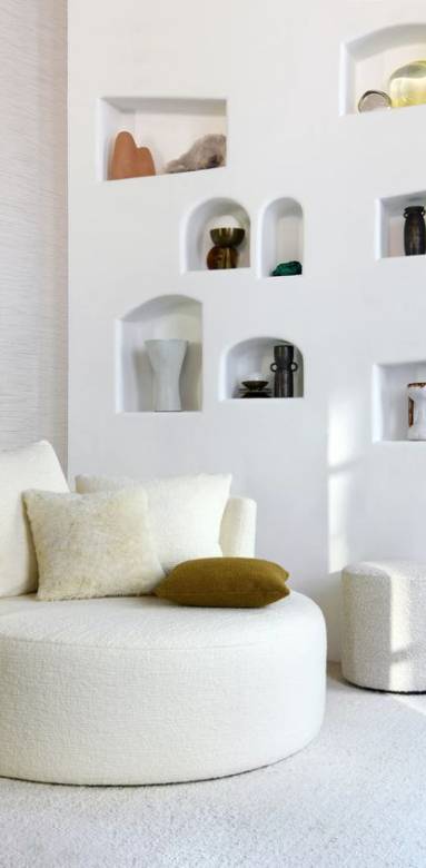 Pouf en laine bouclée