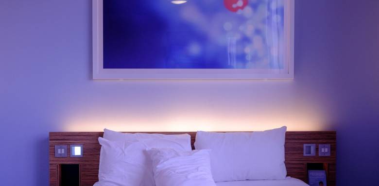 Chambre à coucher éclairage tête de lit