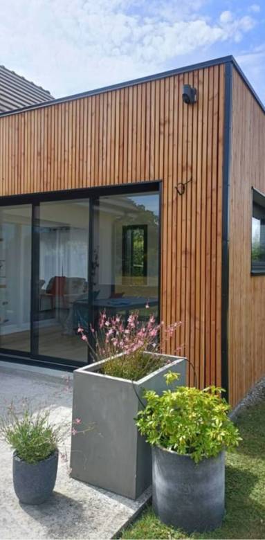 Extension bois vs extension maçonnée : quel choix pour agrandir sa maison ?
