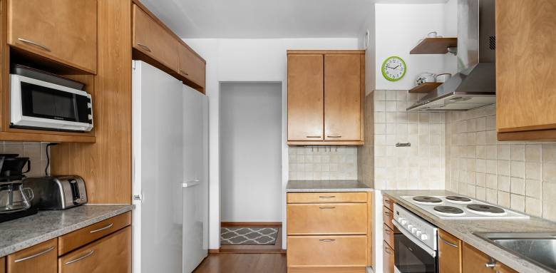 Cuisine en U façades bois