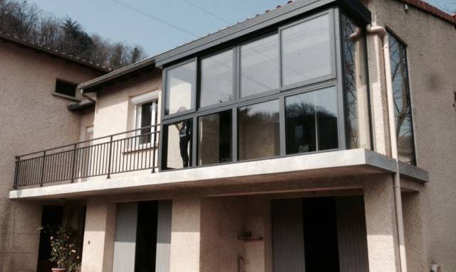 Véranda sur balcon en étage