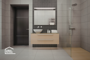 Aménagement d'une salle de bain accessible et moderne avec douche à l'italienne et accessoires ergonomiques