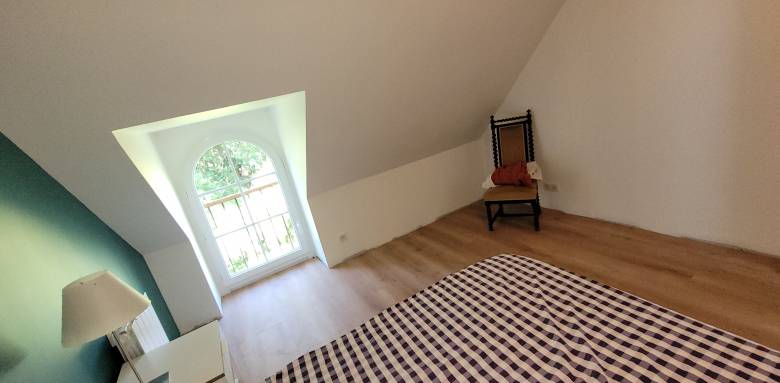 Chambre avec lucarne