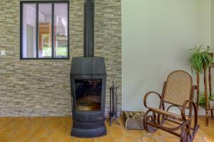Poele à bois dans le salon de notre client, dans le Grésivaudan