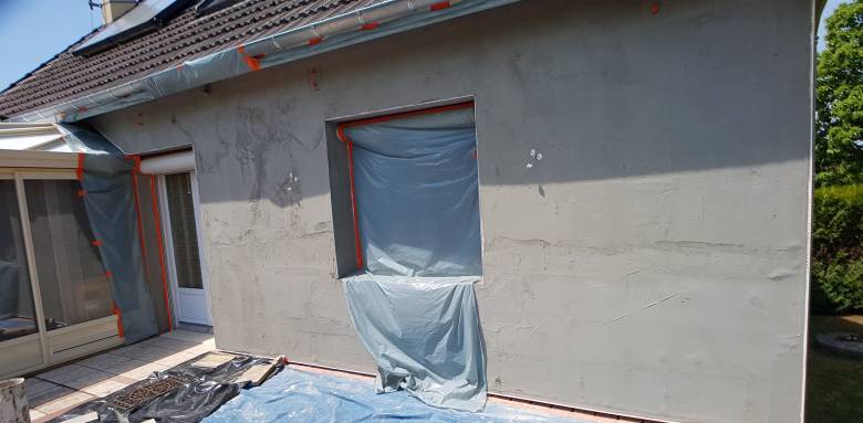 Première couche d'enduit