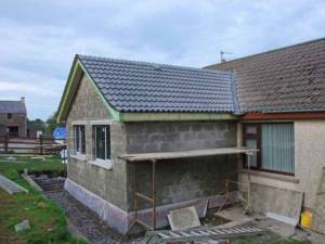 Extension de maison en briques.