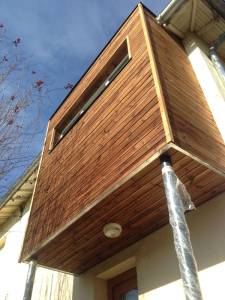 Extension latérale bois en façade latérale maison