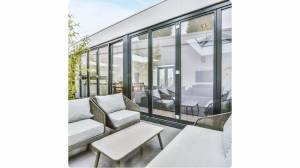 Aménager une véranda : transformez votre maison en espace lumineux et accueillant - Port-en-Bessin-Huppain 14520