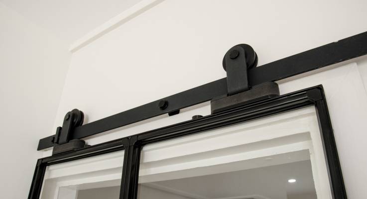Porte coulissante en applique