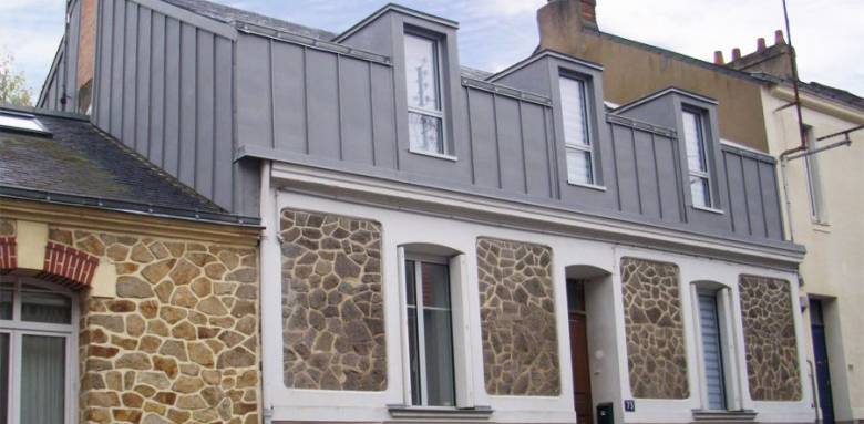 surélévation de maison - toiture zinc - zone urbaine -
