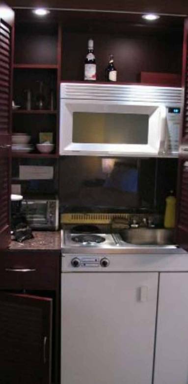 Cuisine pour studio, intégrée dans un placard
