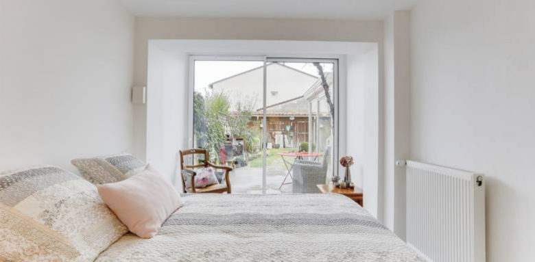 transformation d'un garage en chambre lumineuse