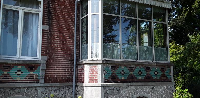 Rénovation d'un jardin d'hiver avec menuiserie aluminium anodisé