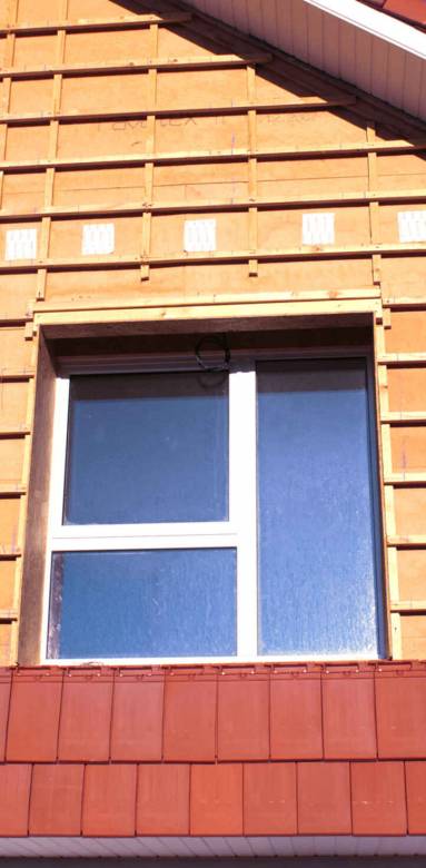 Calvados - Bardage en tuiles pour l'isolation extérieure d'une maison