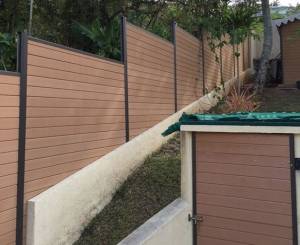 Poser une clôture sur terrain en pente Amiens