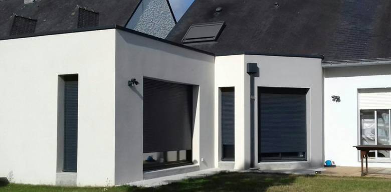 Extension de maison à toit plat béton
