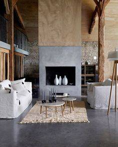  Une cheminée moderne dans une maison ancienne à Grosrouvre