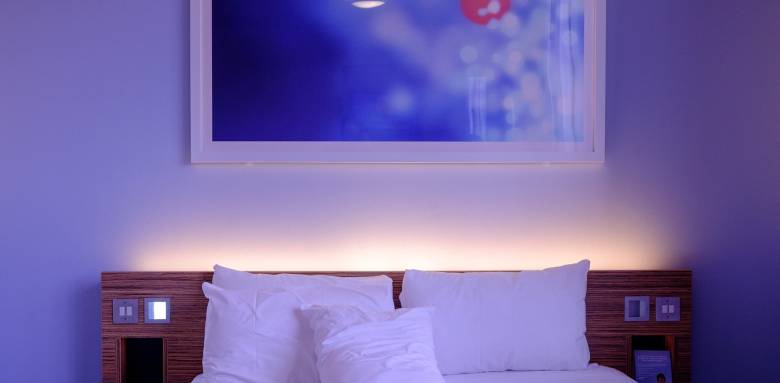 Chambre à coucher éclairage tête de lit