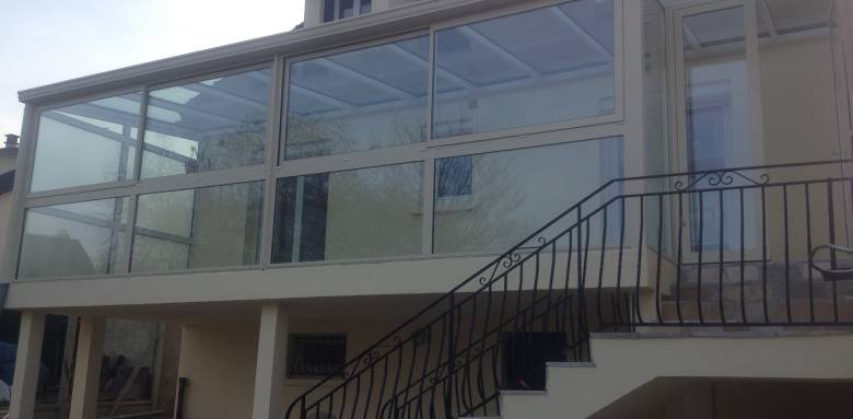 Agrandissement de maison avec terrasse vitrée