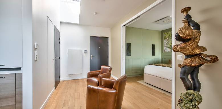 ouverture sur le salon chambre Paris