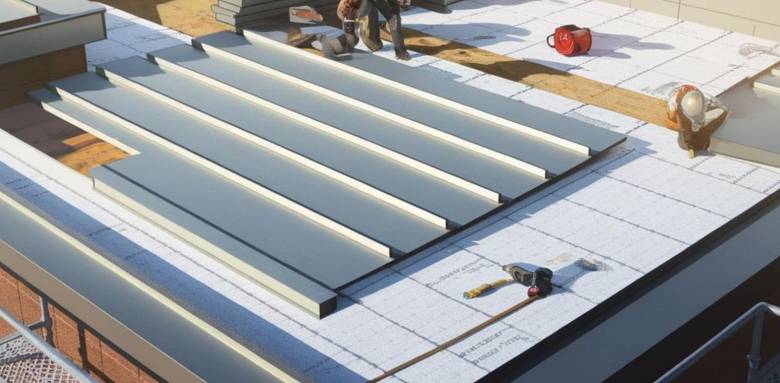 Extension avec toit plat en bac acier