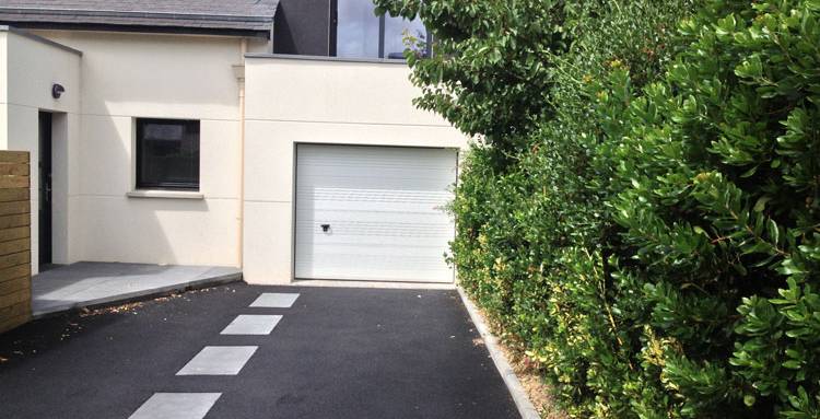 Surélévation partielle au-dessus d'un garage