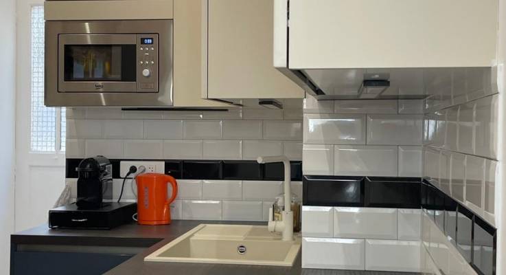 Rénovation et modernisation de la cuisine de l’agence La Maison des Travaux Paris 17