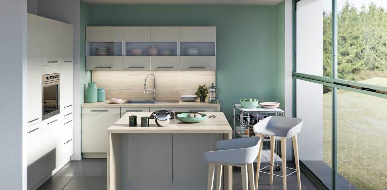 Cuisine avec baie vitrée sur le jardin à Bourdonné