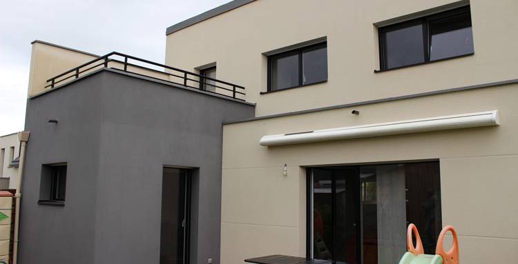 Extension latérale + surélévation de maison