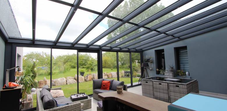 extension de maison à toit plat vitré 
