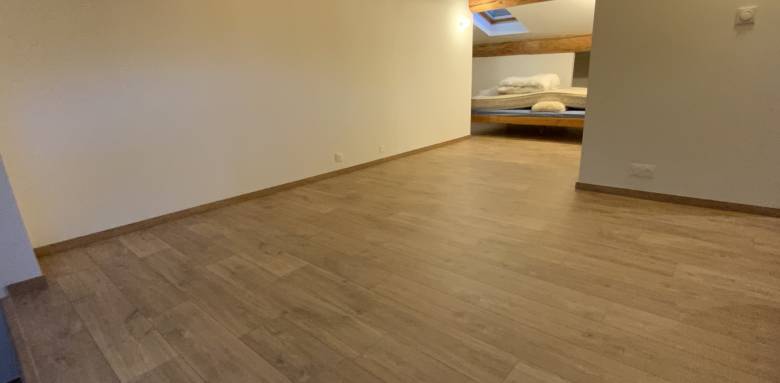 Renforcement plancher combles après restauration poutres et solives