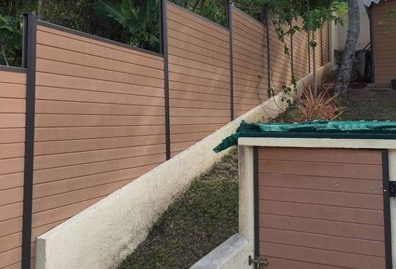 Poser une clôture sur terrain en pente Amiens