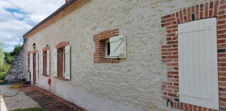 Ravalement de façade en pierre et brique