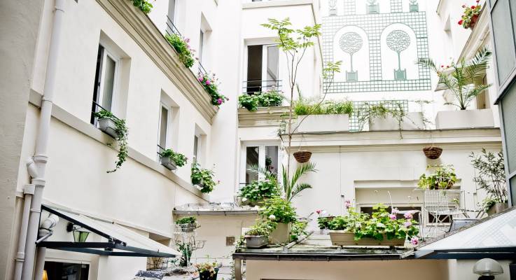 Rénovation de la façade d'un immeuble par l'agence de Boulogne-Bllancourt