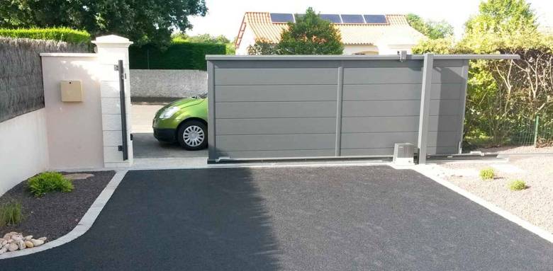 Portail coulissant motorisé - bureau d'études 77, menuisier 77, maçon 77, entreprise de maçonnerie 77, électricien 77, entreprise d'électricité générale 77, domoticien 77