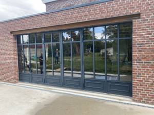 Création d'une large baie vitrée sur jardin 