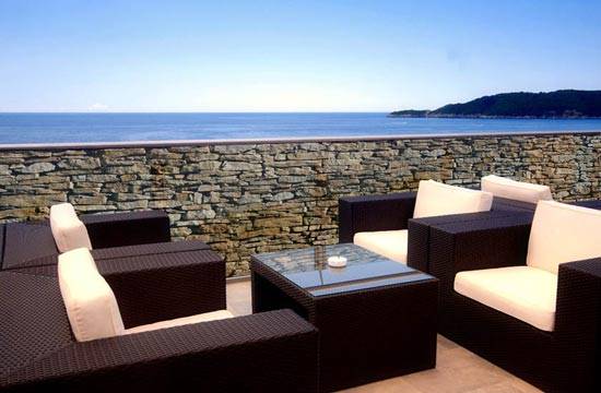 Brise-vue trompe l'oeil façon mur en brique