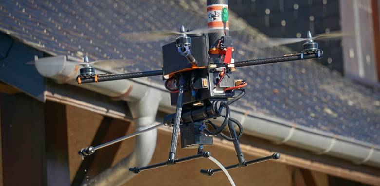 Nettoyage cheneaux et façade par drone