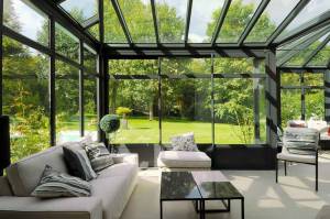 Véranda Technal vert en aluminium