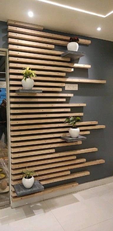 Décoration murale en tasseaux de bois